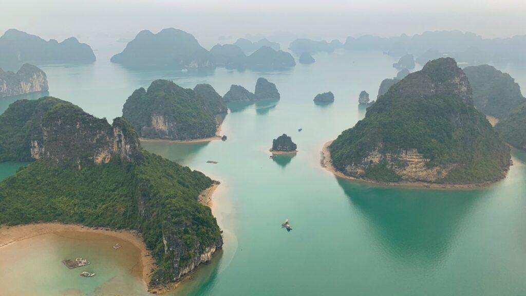 Aerial Horizons, Nautical Marvels: Halong Bay by Yacht and Helicopter